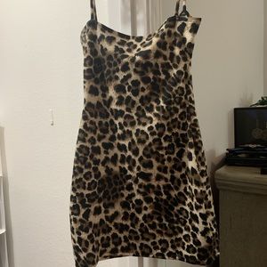 Cheetah print dress by Adriana Sahar